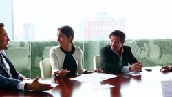 MS PAN Group of business executives laughing together in discussion during meeting in office conference room Stock Footage