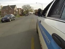 Police car responding to an emergency call News Clip