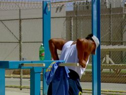 WS ZO Prisoner working out in prison yard / Los Angeles, California, USA Stock Footage
