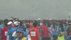 CLEAN : Marathon runners brave Beijings hazardous air conditions News Clip