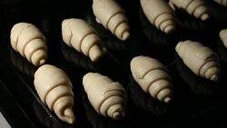 Fermenting and baking croissants Stock Footage