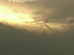 WS View of Large cloud bank moving across and revealing rising sun / Namaqualand, Northern Cape, South Africa Stock Footage