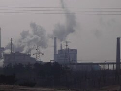 Steel factory is producing, chimney emissions. Stock Footage