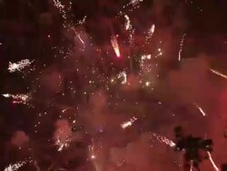 Wide Shot Zoom In - Colorful fireworks in the night sky / New Orleans Louisiana Stock Footage