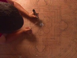 MS ZO  Man laboring over  center detail of mandala sand painting  / Kathmandu, Central, Nepal Stock Footage