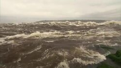 Wide shot of very fast flowing water on Congo river Stock Footage