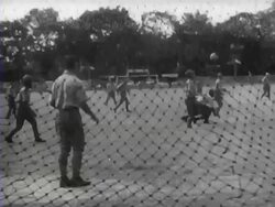 A football match between heiho's. Girls cheer on the football players Stock Footage