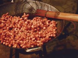 pig sausage be cooked on boiled oil Stock Footage