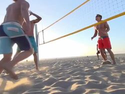 Men playing beach volleyball. - Slow Motion Stock Footage