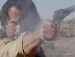 Slow motion of man raising pistol and firing it. Stock Footage