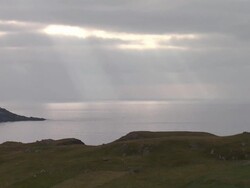 Rays of sunshine through grey clouds News Clip