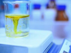 Mixing liquid in beaker Stock Footage