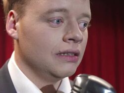 HD: Nervous Performer Talking Into Microphone Stock Footage