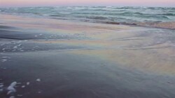 Dawn at the Beach on Padre Island Texas Shoreline waves crashing on the beach during sunrise Stock Footage