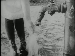 REENACTMENT: 1887 teacher Anne Sullivan uses finger spelling to teach Helen Keller to communicate. News Clip