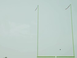 WS, LA, American football ball flying over goal, Staten Island, New York, USA Stock Footage