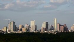 2 Bats flying around the Austin Skyline near Sunset at the Live Music Capital of the World Austin , Texas Stock Footage