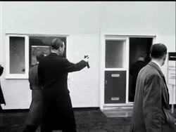 MINISTERS SEE NEW HOUSES - News Clip