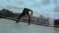 Film footage of young man spraypainting graffiti wall in Austin, Texas Stock Footage