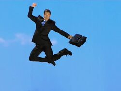 HD Super Slow-Mo: Happy Yuppie Jumping In The Sky Stock Footage