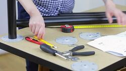 Young female carpenter assembling new furniture at home. Stock Footage