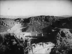B/W 1936 high angle tilt down Hoover Dam (Boulder Dam) under construction / Nevada / newsreel Stock Footage