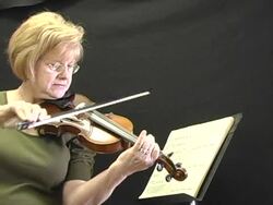 Grandma playing fiddle Stock Footage