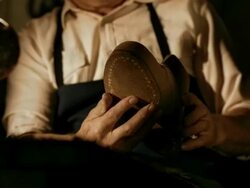 HD: Traditional Shoemaker Inspecting The Shoe Stock Footage