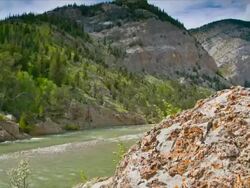 Time lapse of storm clouds over canyon Stock Footage