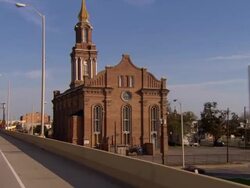 POV, Car driving on highway, passing church, New Orleans, Louisiana, USA Stock Footage