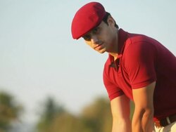 Man playing golf in a golf course  Stock Footage