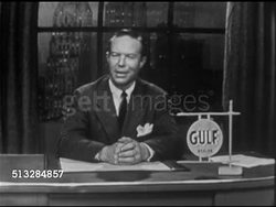 1952: SPONSOR BREAK: Bill Rogers sitting at desk on set w/ Gulf logo sign on desktop, SOT saying have to remember to make opinions count, free choice. Bill placing model of gas pump on front of desk, choosing Gulf No-Nox gasoline, outstanding choice.. Instructional Video