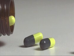High speed pills falling from jar Stock Footage