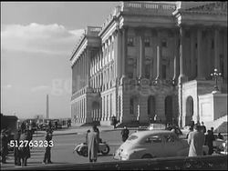 1947: WASHINGTON, D.C.: Angled WS East front of Capitol building w/ people standing on sidewalk watching motorcade passing front of building & turning into parking area. Ws People walking up Capitol building steps. Instructional Video