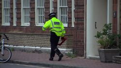 Police Officers at Lord Sewel's Home News Clip