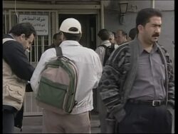 Inspectors at missile destruction site plus street scenes, theatre News Clip