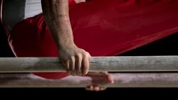 SLO MO Hands of gymnast during routine on parallel bars Stock Footage