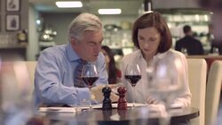 MS PAN Business people discussing in restaurant Stock Footage