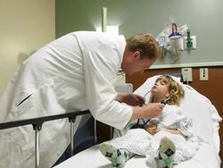 Doctor Working With Child Stock Footage