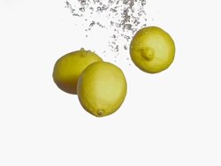 HD Super Slow-Mo: Lemons Splashing Into Water Stock Footage