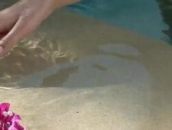Woman's hand in swimming pool, Cape Town South Africa Stock Footage