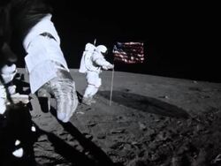 Apollo 14 astronauts planting American flag on Moon surface Stock Footage