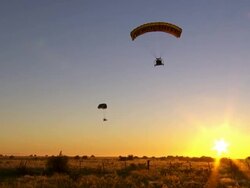 WS PAN TS View of Aerochute flyover dusk / Werribee, Victoria, Australia Stock Footage