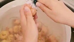 potatoes under running water Stock Footage