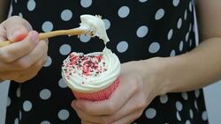 Lady 's eatting cupcake with fork close up Stock Footage