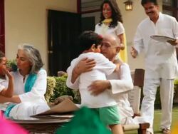 Family eating gujia in holi festival  Stock Footage