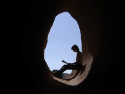 Trekker Silhouette with a Map Stock Footage