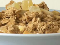 Muesli being poured into bowl Stock Footage