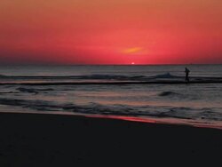 Daybreak runner and fisherman Stock Footage