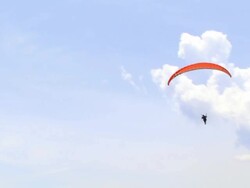 Paraglider in Clouds Stock Footage